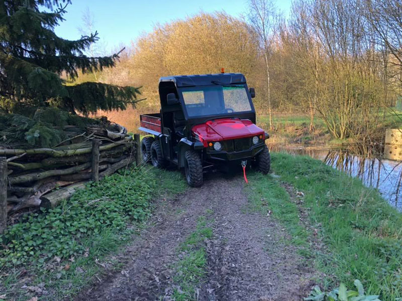 MIJIE Electric farm vehicles by the river